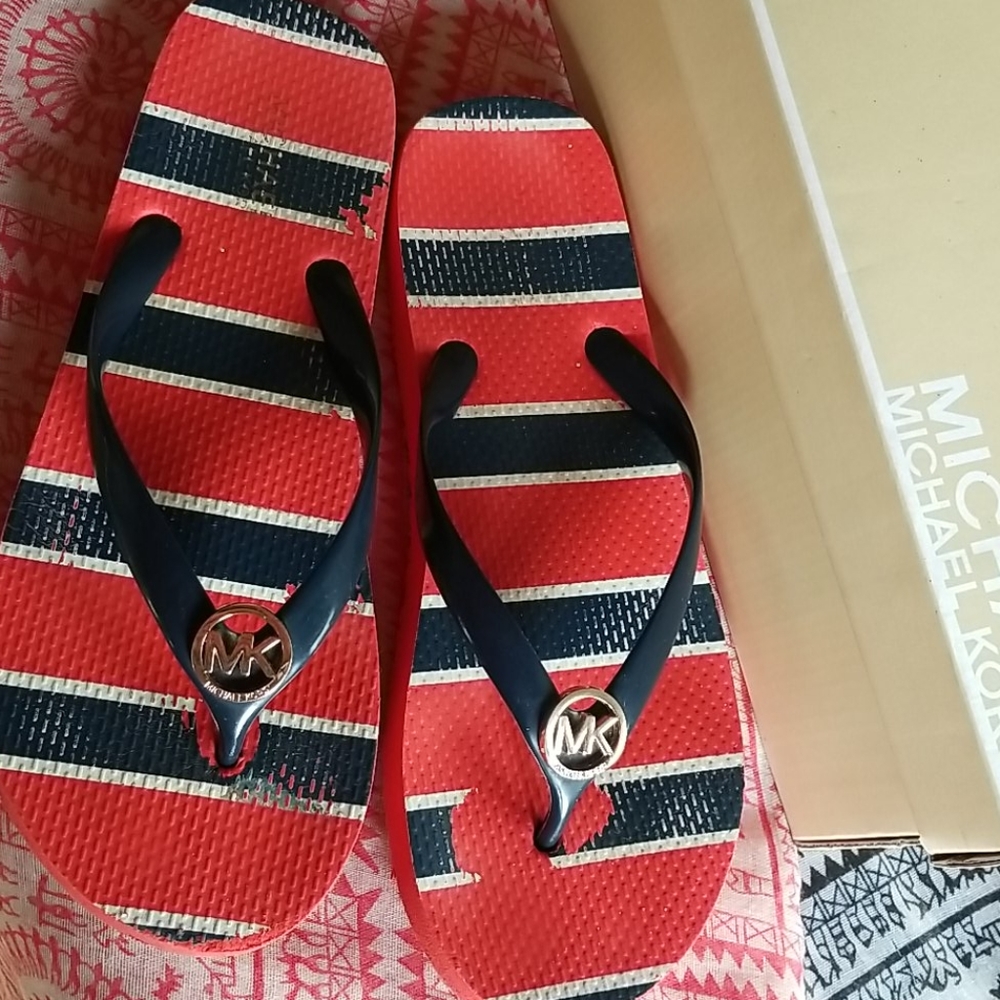Michael Kors flip flaps